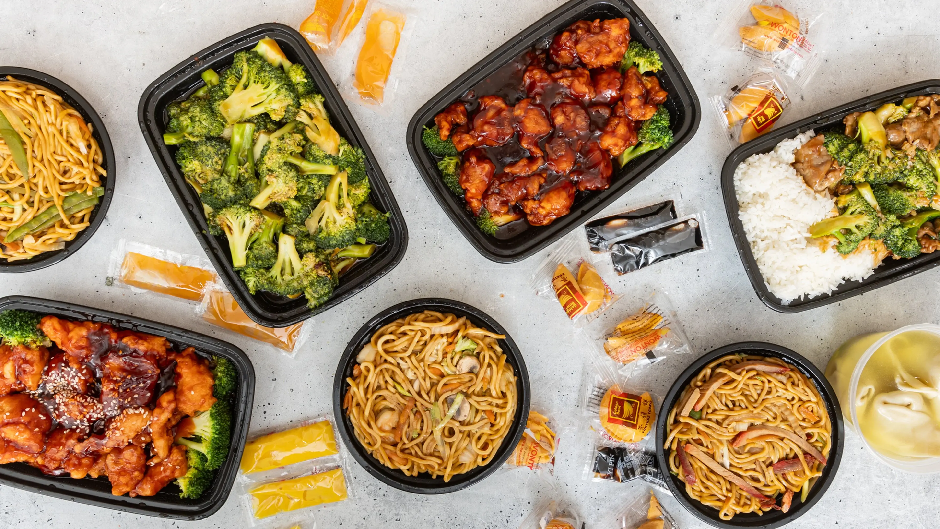 A spread of Chang Jiang takeout containers